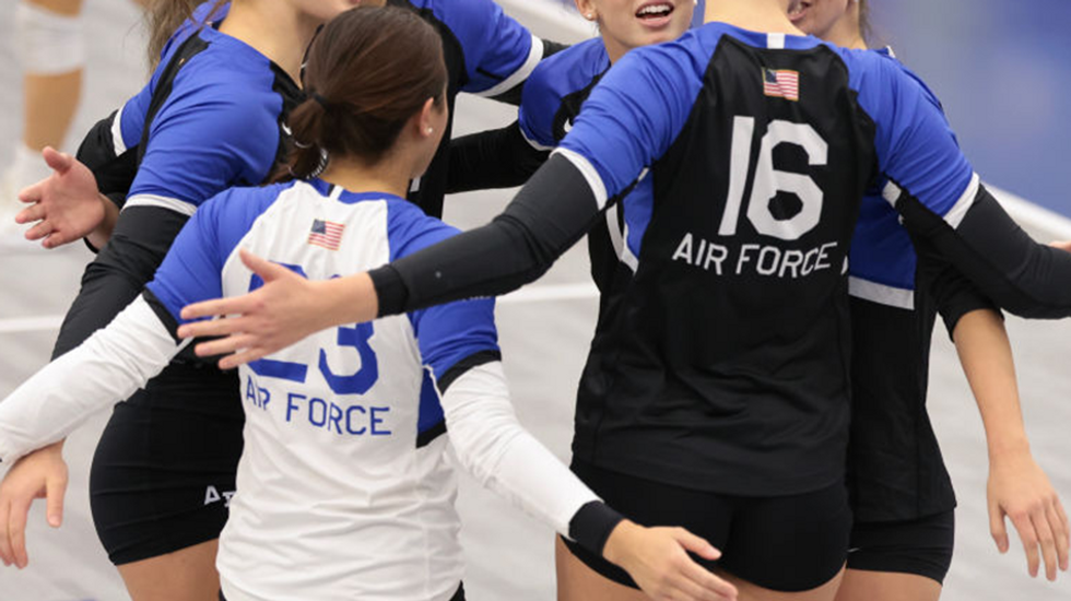 Air Force Academy forces fan to cover pro-women shirt at women's volleyball game featuring controversial transgender player