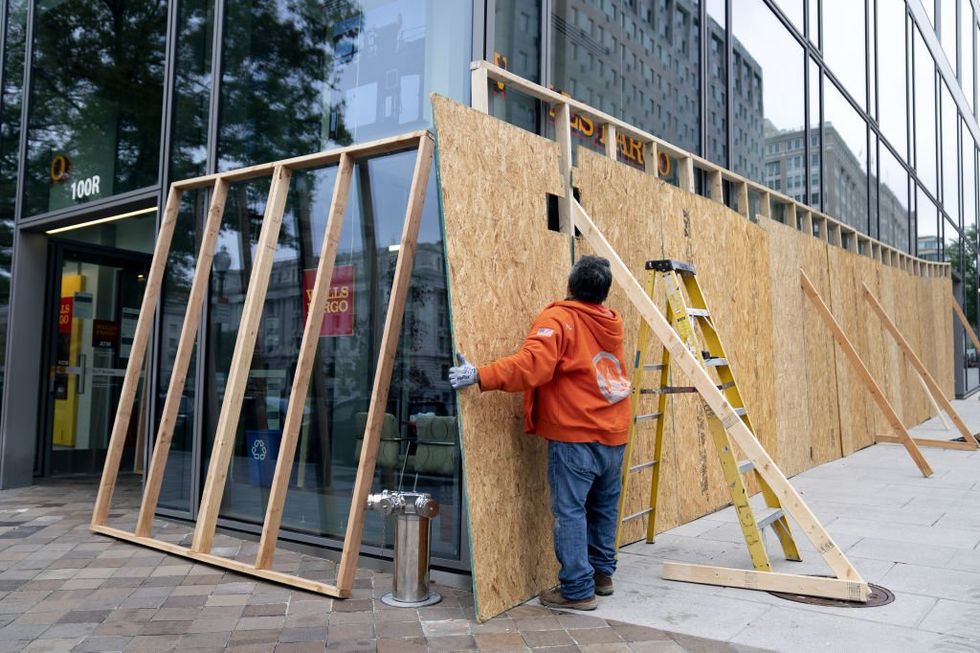 Businesses board up their windows in heavily Democratic cities ahead of Election Day