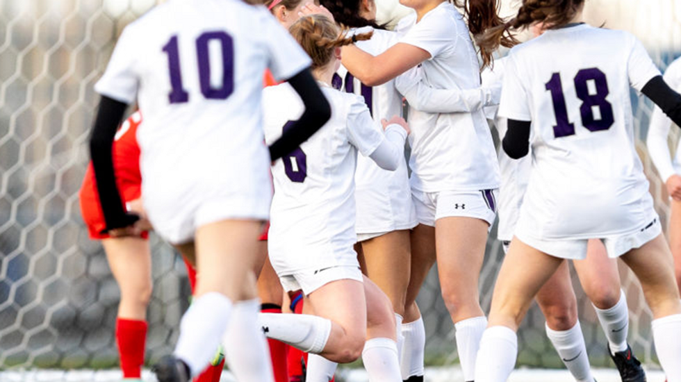 Female HS soccer players refuse to take field against team with male who is already state champion in girls' high jump