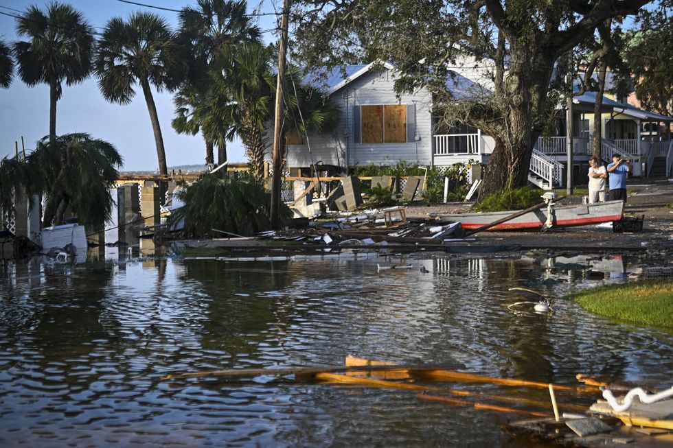 Floridians refusing to evacuate area for Hurricane Helene asked to mark info on themselves so their bodies can be identified