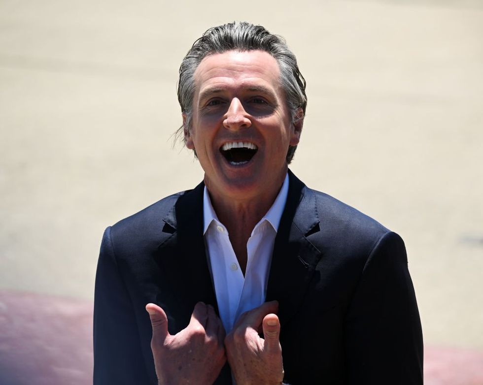 Gavin Newsom chuckles as he signs bills restricting AI use in election ads — but social media users may have last laugh