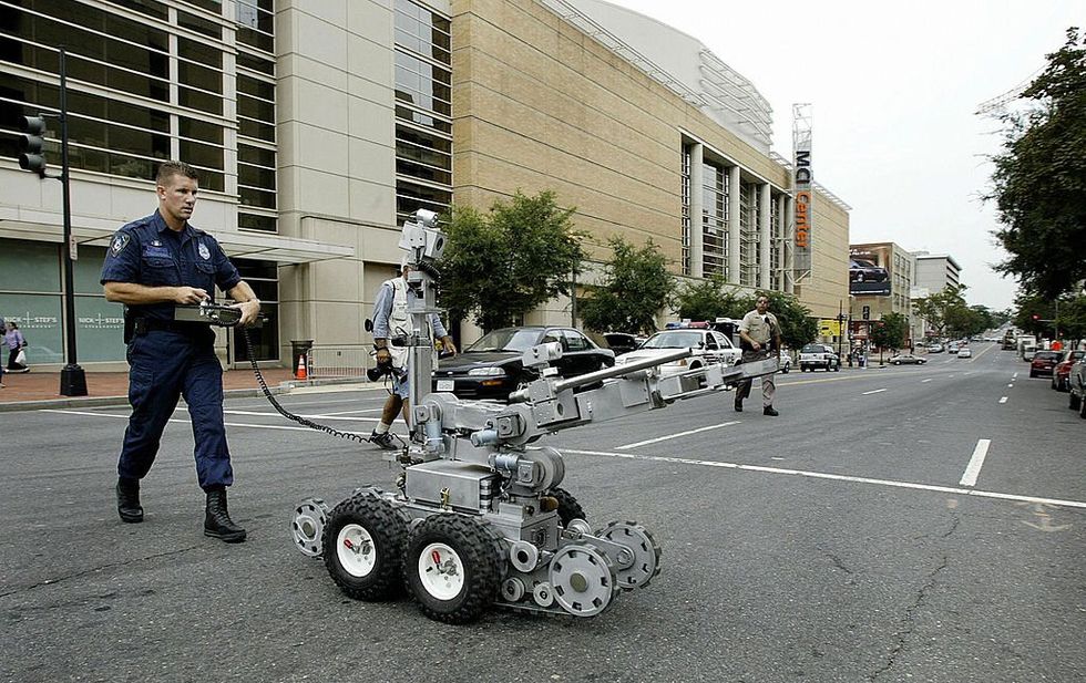 High-tech hero: Video shows police bomb squad robot outsmart, pin down hotel gunman in Texas showdown