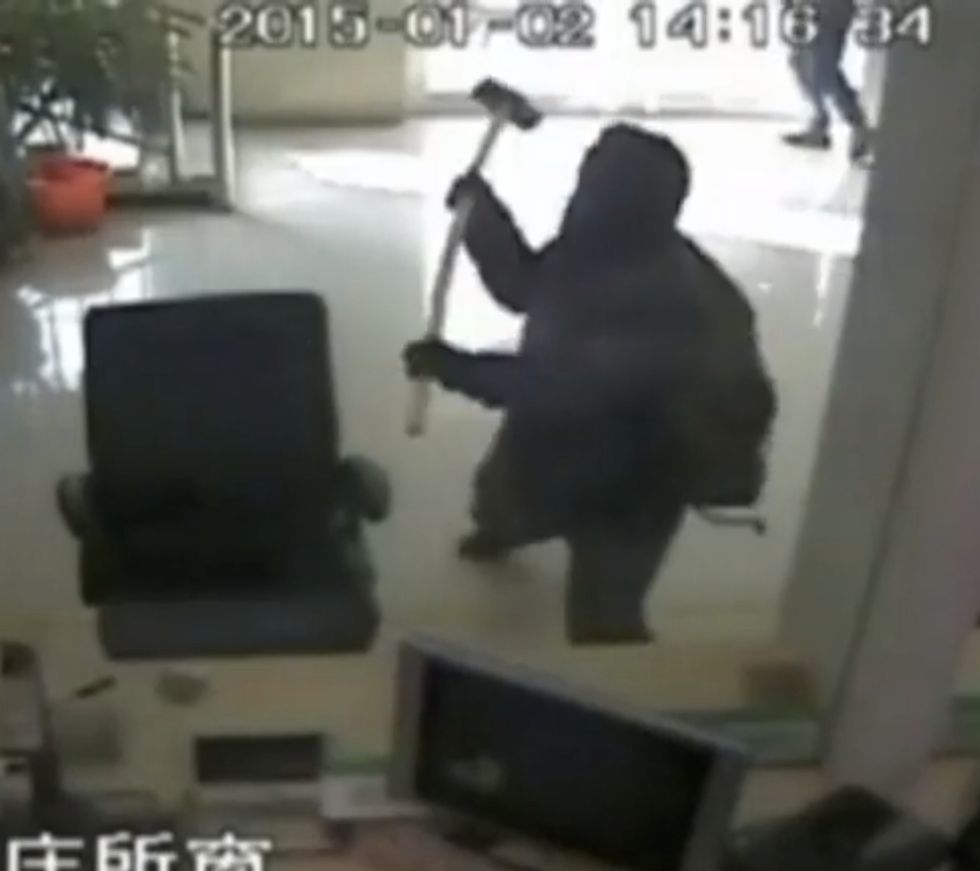 He's About to Smash His Way Into a Bank. Watch What Local People Do to Foil the Robbery.