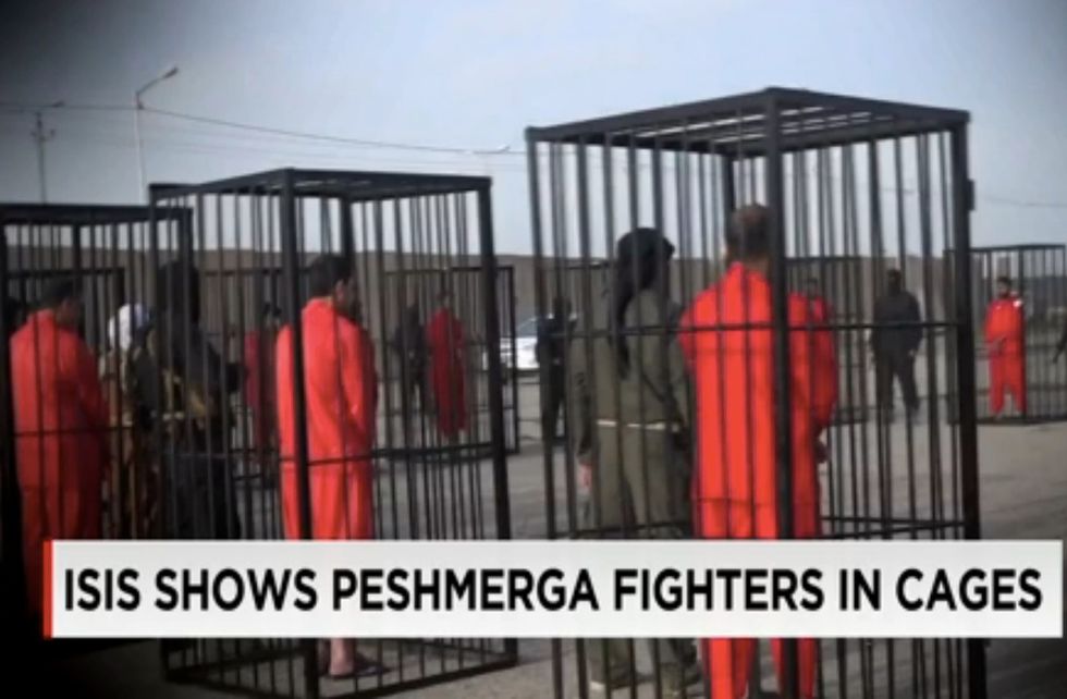 New Islamic State Video Purports to Show Captured Fighters Paraded Through Streets in Cages