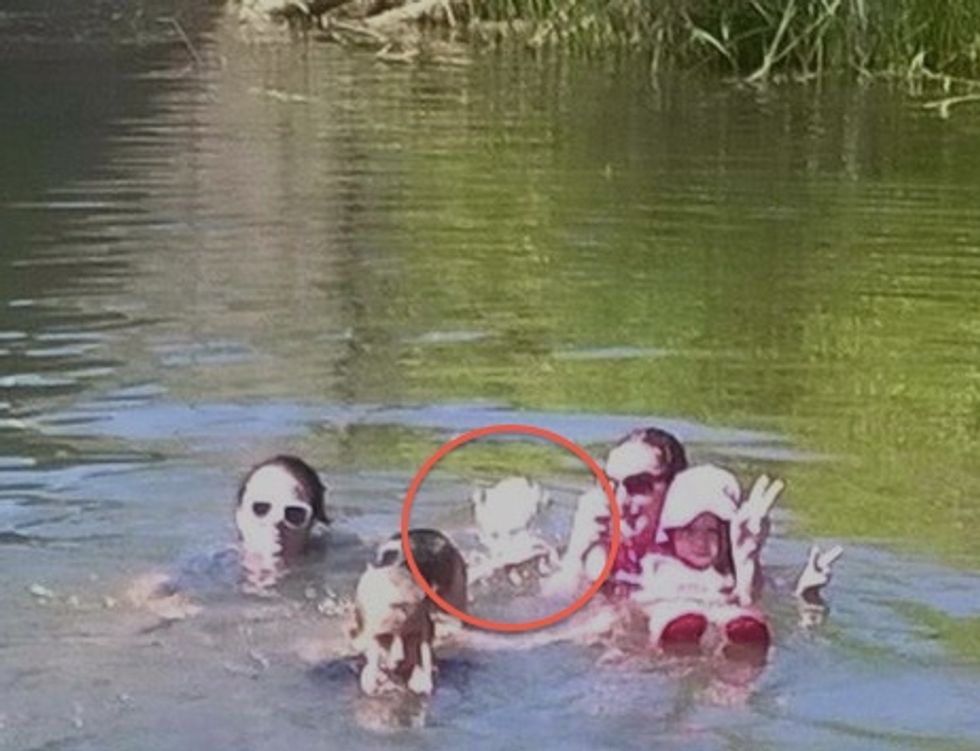 Look Closely at This Photo. Do You See the 'Creepy' Image That Two Women Claim Wasn't in the Water With Them That Day?