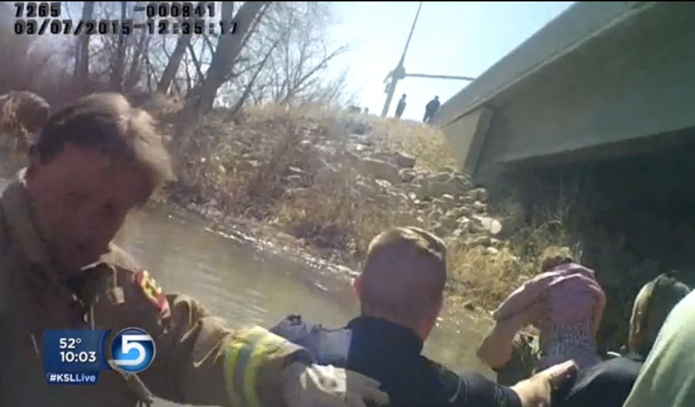 New Video Captures the Intense Seconds When Police Realize There's a Baby Trapped in a Wrecked Car