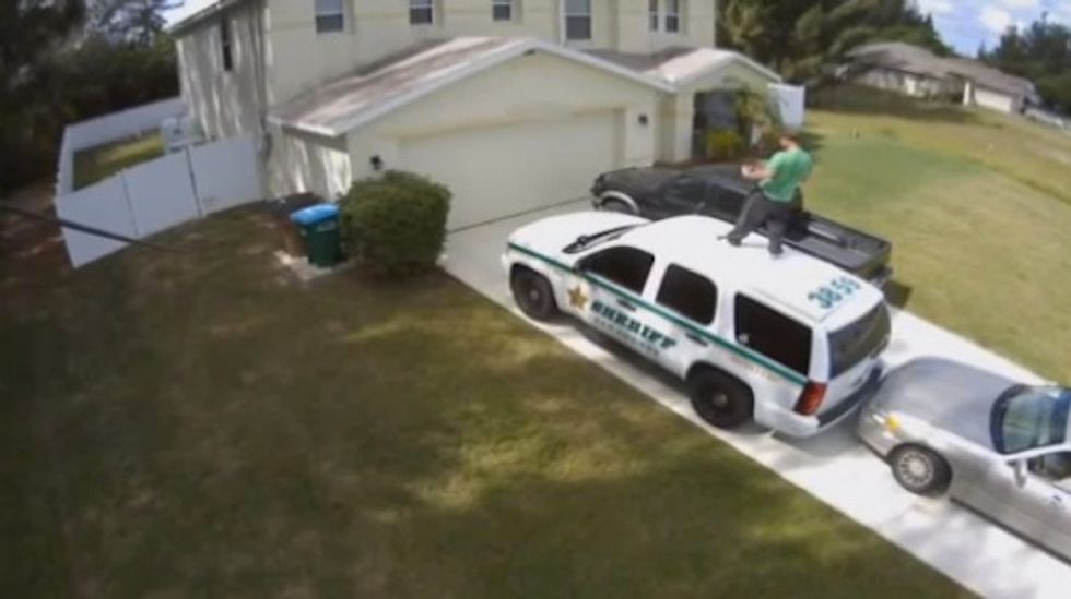 Man Caught on Video Dancing on the Roof of Sheriff's SUV, Stealing American Flag: The Reason Why Is Even Crazier