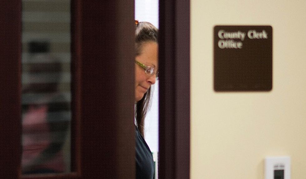 First Gay Couple Leaves Kentucky Courthouse With Marriage License as Defiant Christian Clerk Remains Behind Bars