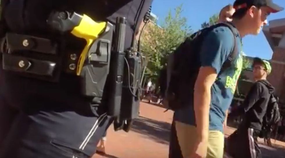 Students Were Giving Away Copies of Constitution in 'Free Speech Zone.' Then, Cop Confronted Them