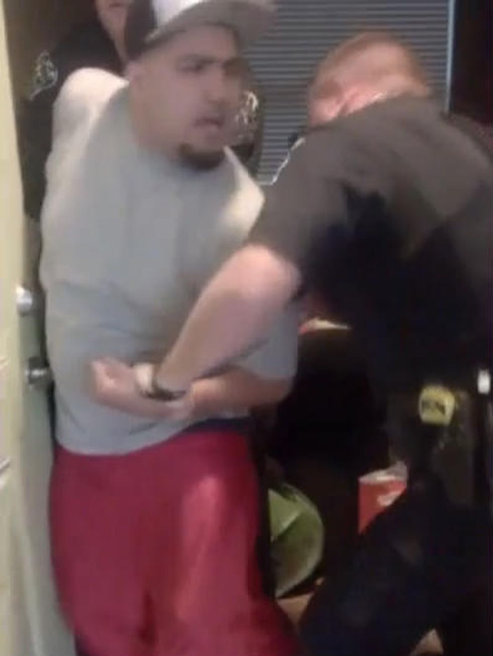 'I'm Not Resisting Arrest,' Man Screams at Officers — but Watch the Entire Video