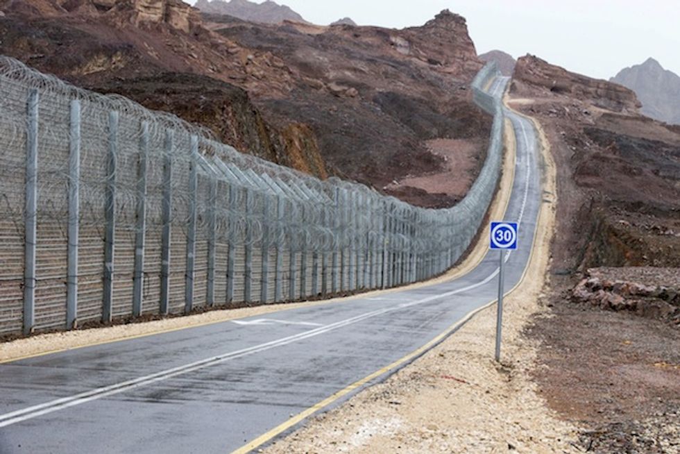 Illegal Migrants Have Been Using Ladders to Climb Over Fence Into Israel. Here's How the Government Reportedly Plans to Stop It.