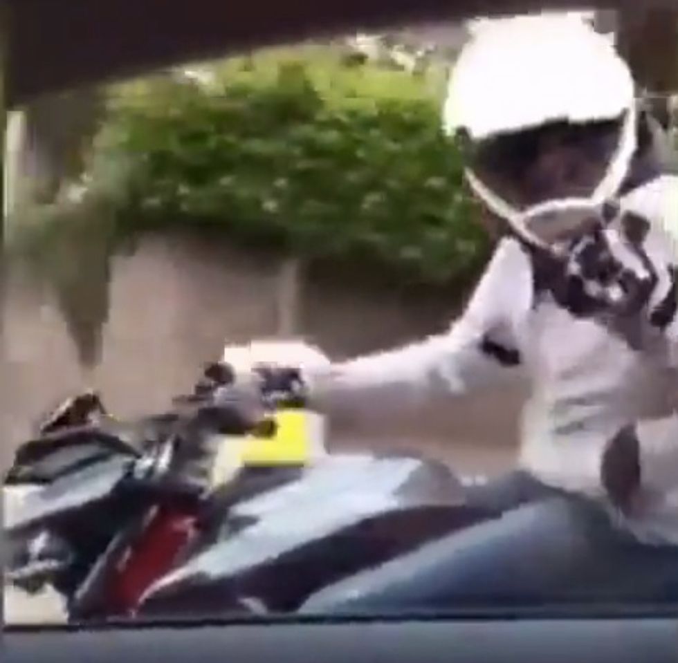 Irritated Motorcyclist Points and Yells at Car Instead of Focusing on Road — and Pays the Price