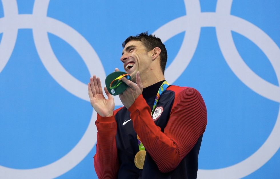 Why Olympic Legend Michael Phelps Was Caught Laughing During National Anthem