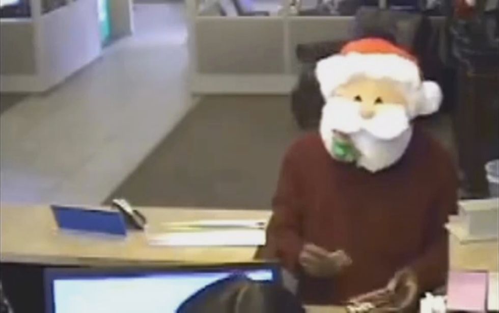 Festive bank robber hands out Christmas treats during heist