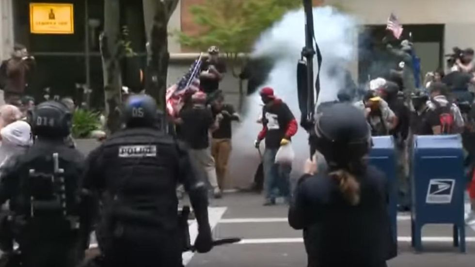 Riot declared as so-called anti-fascists clash with conservative Patriot Prayer group in Oregon