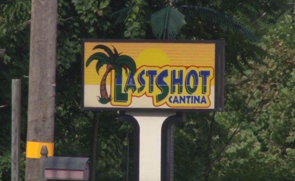 Crook pulls gun at door of First and Last Shot Cantina—and loses nerve when clerk pulls his own gun