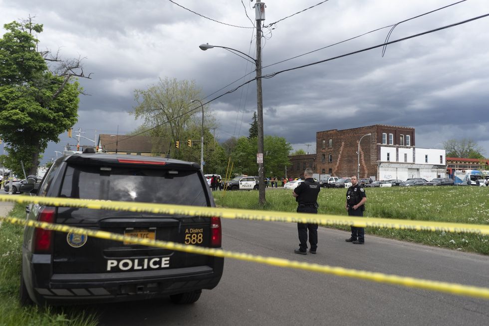 Bodycam video shows Buffalo cop shoot and kill man who was dragging him on the side of his car after traffic stop