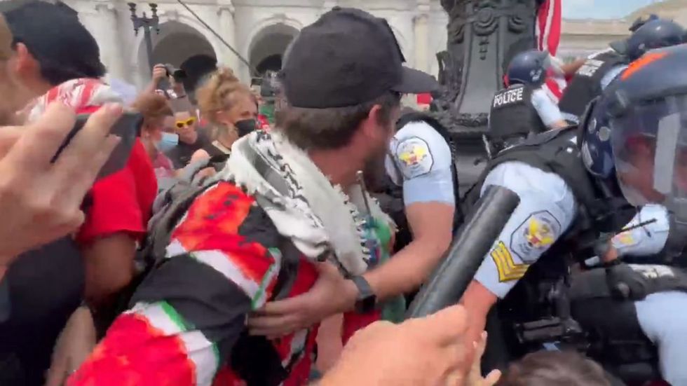 Pro-Hamas protesters take down US flags in DC — police deploy pepper spray to stop mob chase: Video