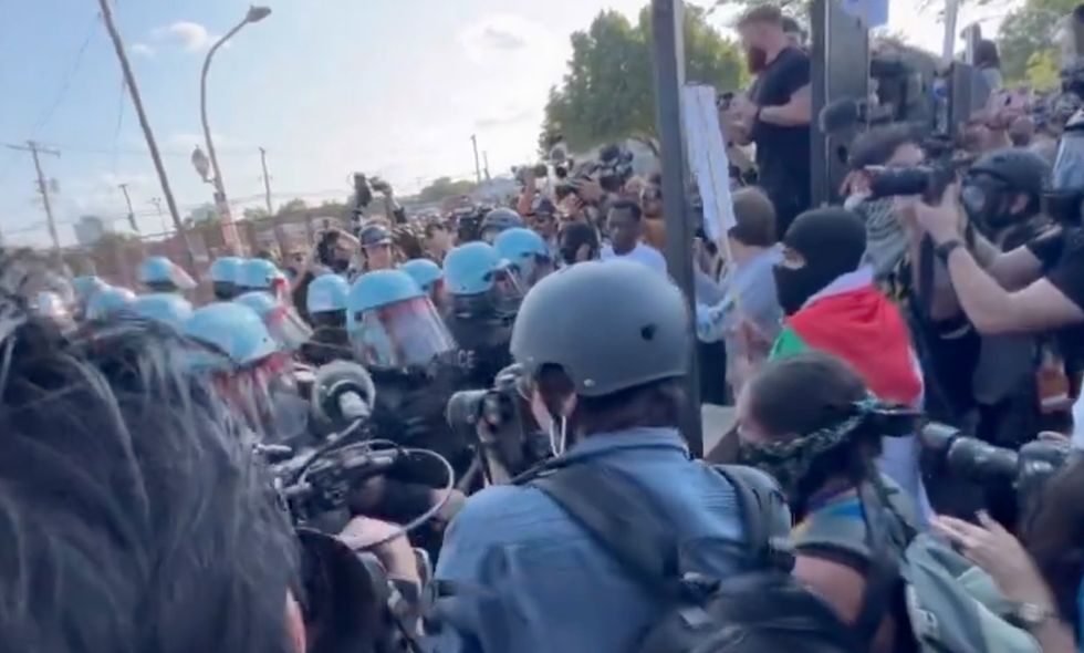 Video shows protesters break through barricade at Democratic National Convention; 4 arrested