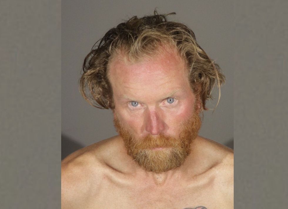 California woman awoke to find homeless man fondling her and exposing himself, police say