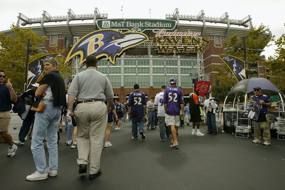 Baltimore police issue arrest warrant for Ravens fan who brutally beat opposing team's fans in viral video after NFL game