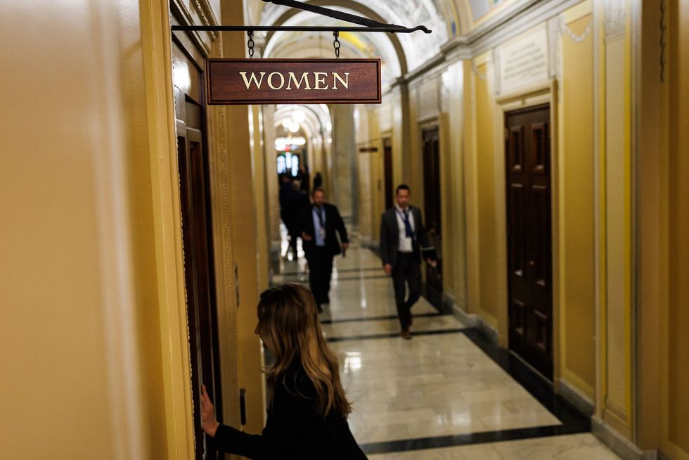 Transgender and nonbinary people oppose bathroom ban with dancing takeover of women's toilets in congressional building