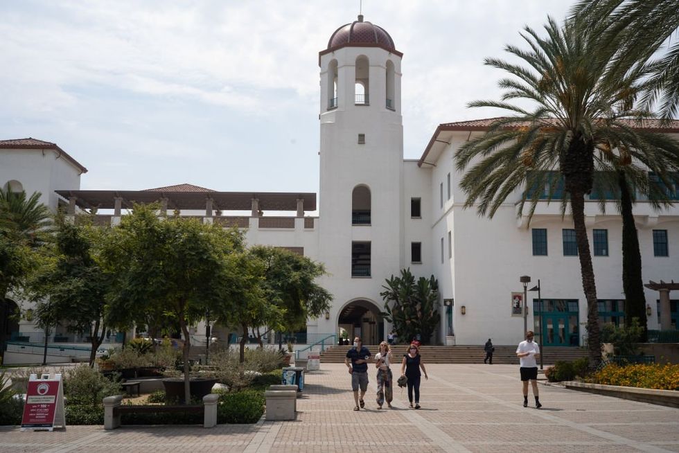 4 fraternity members charged after pledge set on fire during party 'skit' and suffers 3rd-degree burns