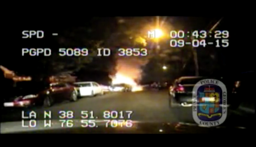 Watch: Police Rush to Dramatically Rescue Passenger Trapped Inside Burning Vehicle