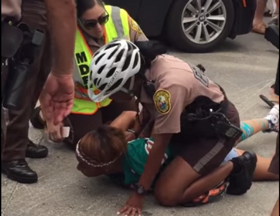 VIDEO: Wife of Miami Dolphins Star Arrested Outside Stadium After Allegedly Pushing Through Police Blockade, Head-Butting Officer
