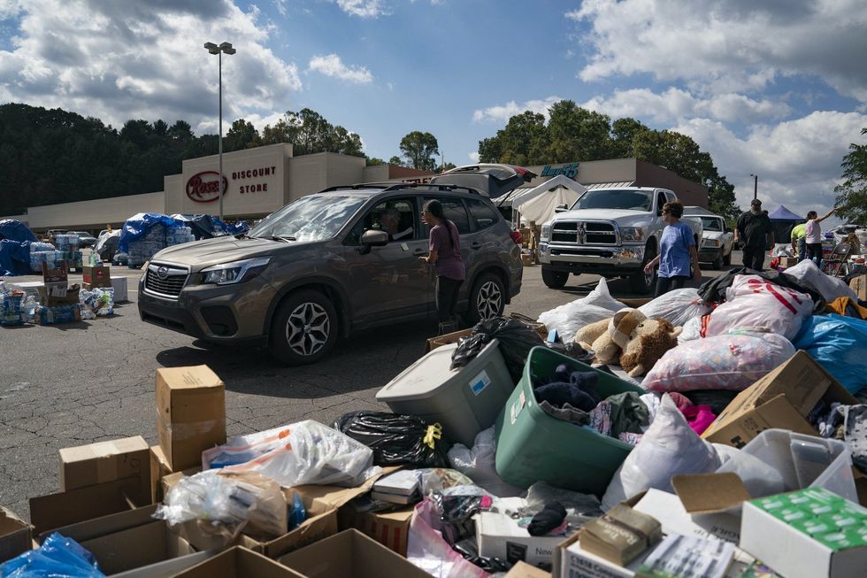 National Guard helicopter crew grounded for flying low over hurricane relief depot and scattering supplies