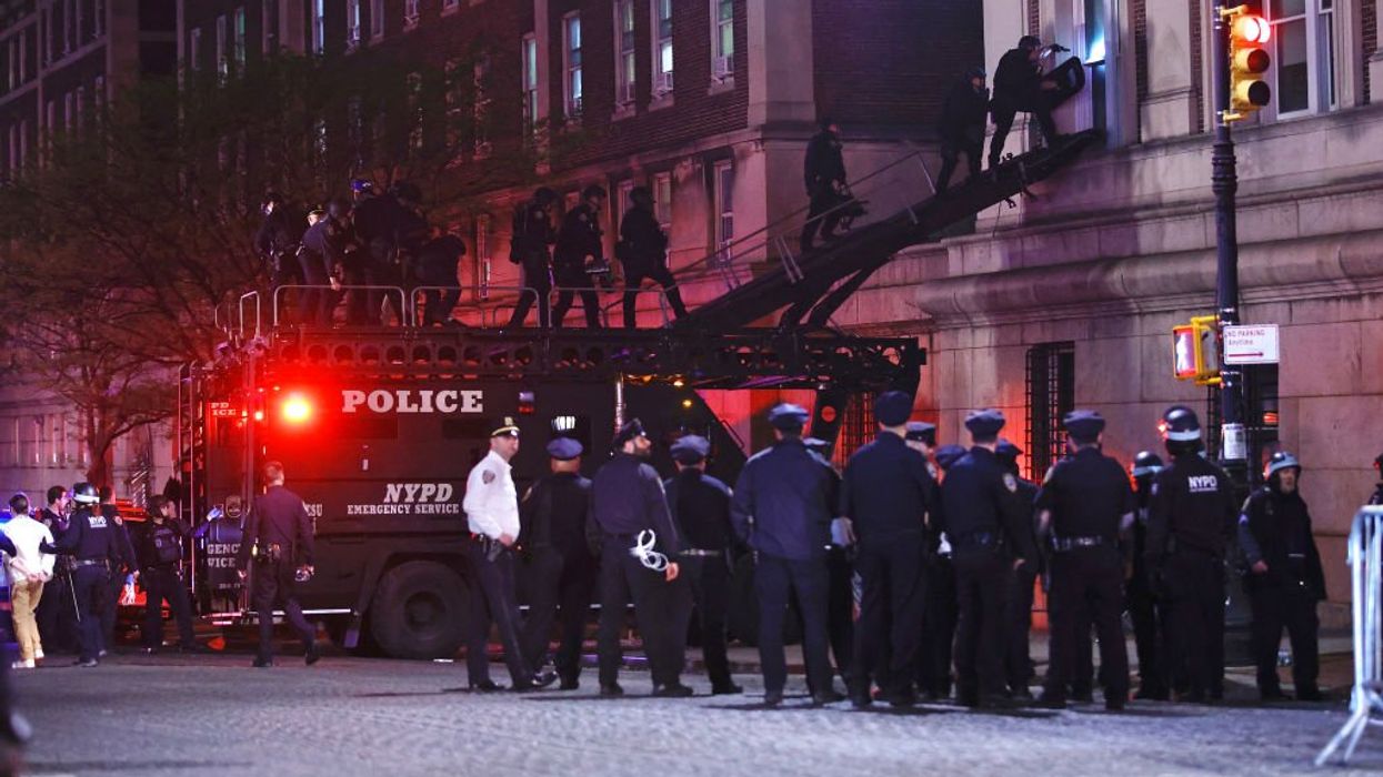NYPD breach occupied Columbia University building and arrest around 100 Hamas-endorsed students
