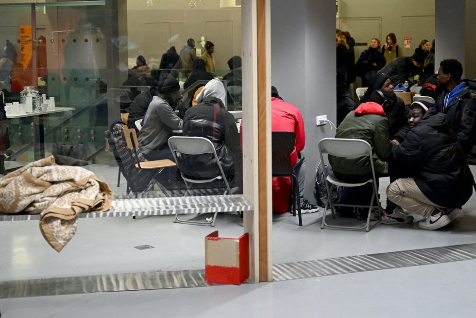 Socialists abandon Parisian theater after alleged sex-related violence from African refugees who refuse to leave