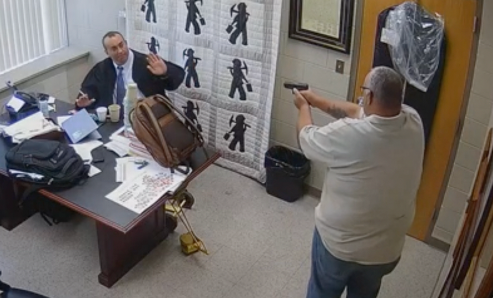 Surveillance video of Kentucky judge getting fatally shot in his chambers is shown during accused sheriff's hearing