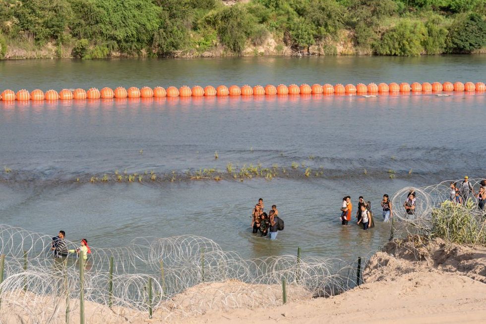 Texas places more buoys in the Rio Grande despite Biden administration lawsuit