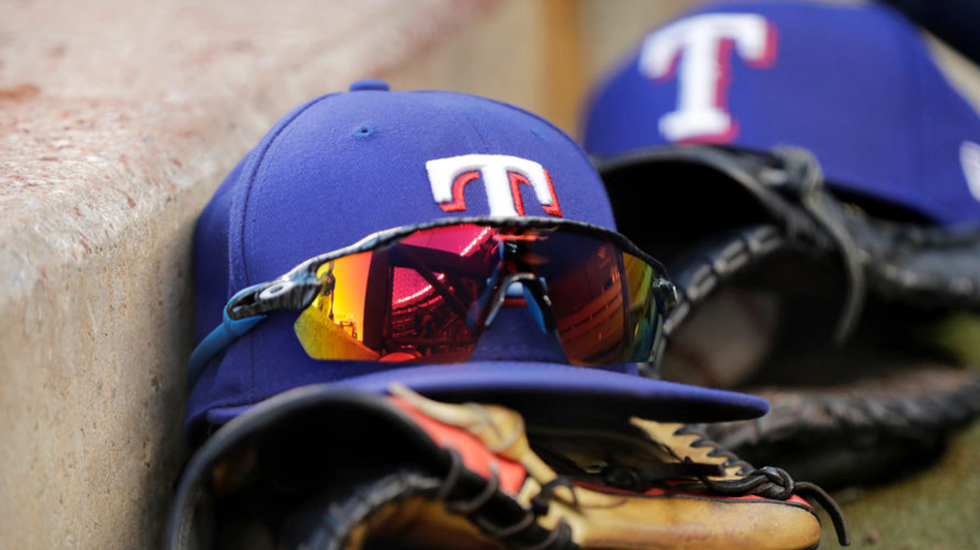 Texas Rangers' now-banned vulgar hat becomes immediate collector's item selling online for $1,000