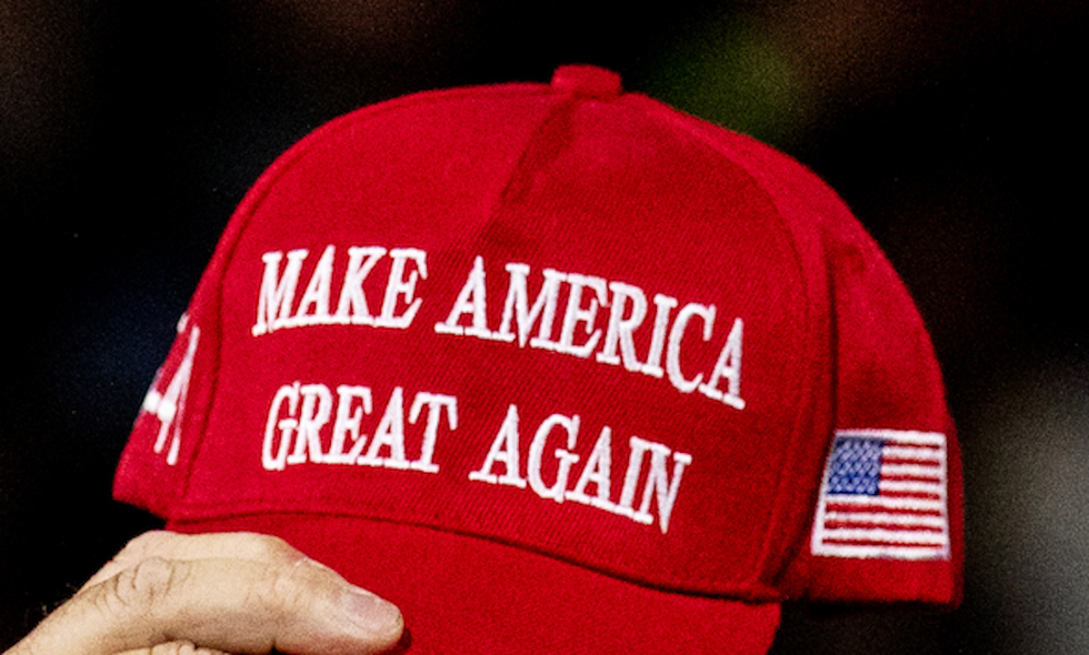 Video: Bartender grabs baseball bat, pounds it on floor, demands female Trump supporter leave bar — because of her MAGA hat