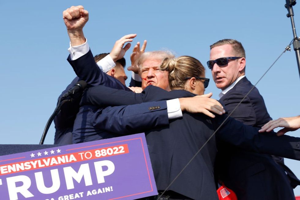 Video: Donald Trump whisked off stage after shots fired in assassination attempt