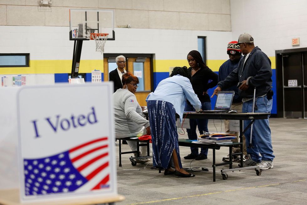 Viral video shows fight between man and poll workers over 'Let's Go Brandon!' hat