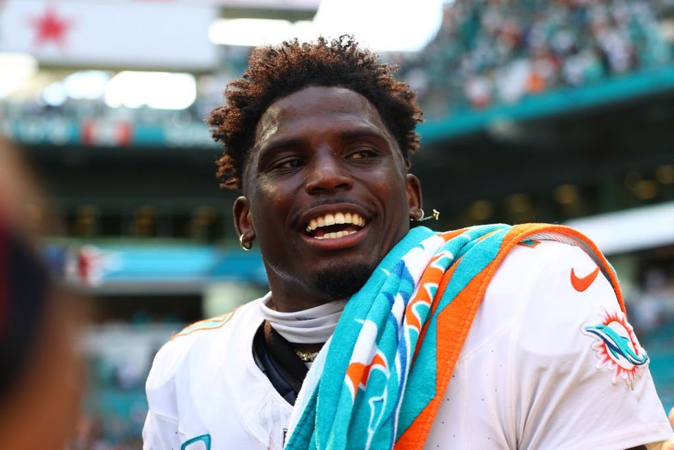 'What if I wasn't Tyreek Hill?' Police officer placed on leave after Miami Dolphins star is handcuffed hours before game