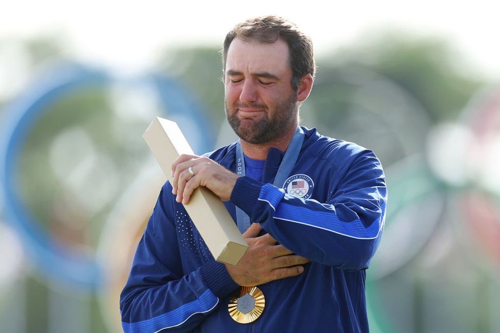 World No. 1 golfer Scottie Scheffler breaks down in tears during 'Star-Spangled Banner' after winning Olympic gold medal